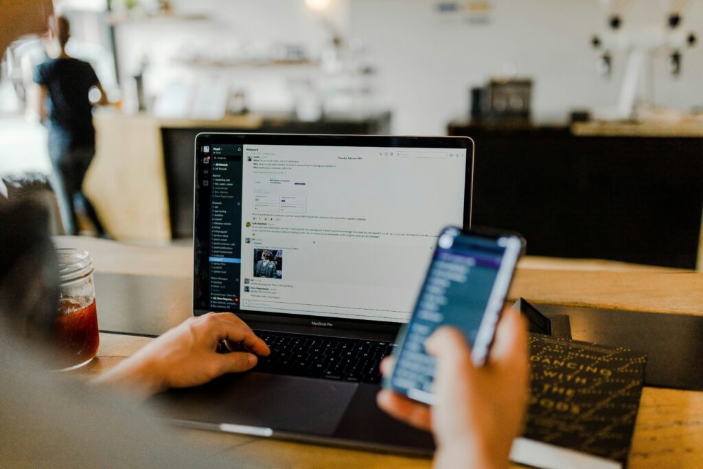 Slack message with team communicating and collaborating in app on desktop and mobile.